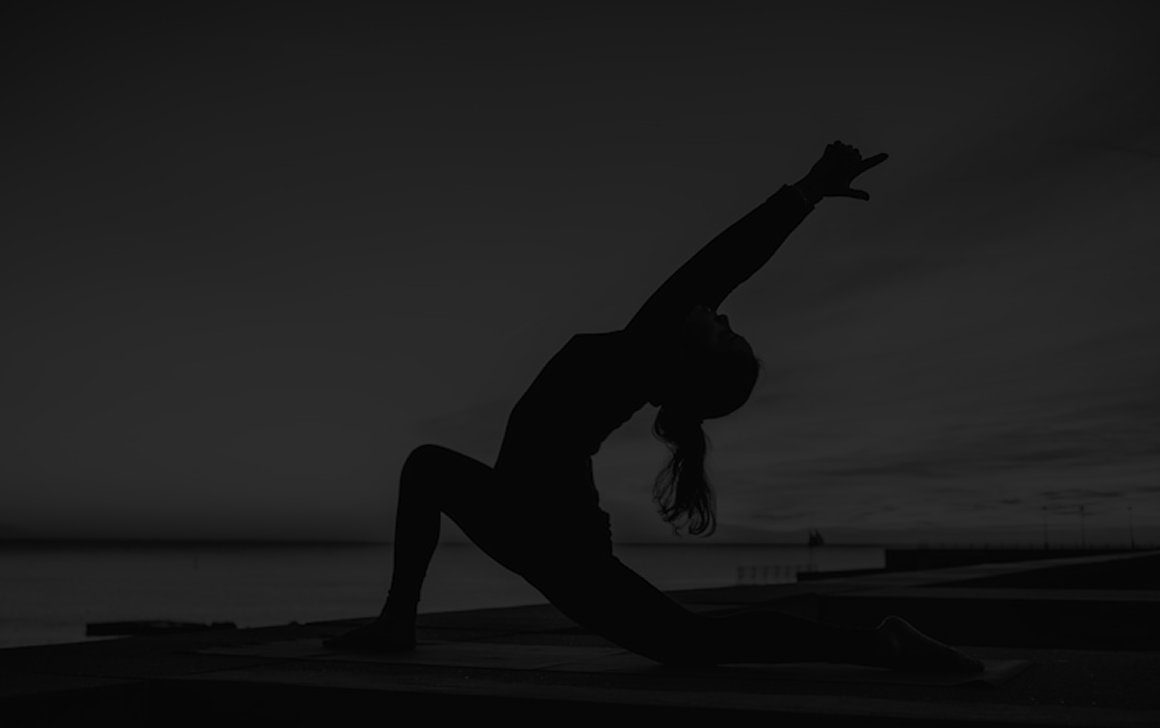 A person doing a yoga pose, silhouette